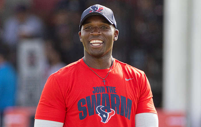 Houston Texans head coach DeMeco Ryans watches players warm up during a 2023 training camp practice at the Houston Methodist Training Center.
